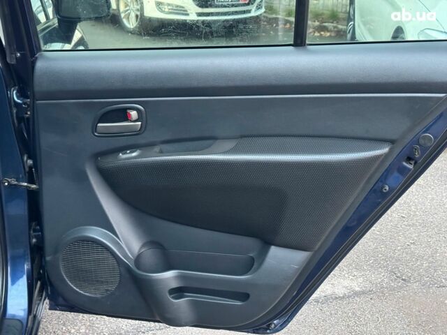 Синий Киа Каренс, объемом двигателя 2 л и пробегом 234 тыс. км за 6990 $, фото 18 на Automoto.ua