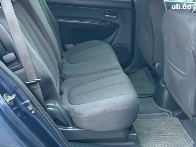 Синий Киа Каренс, объемом двигателя 2 л и пробегом 234 тыс. км за 6990 $, фото 19 на Automoto.ua