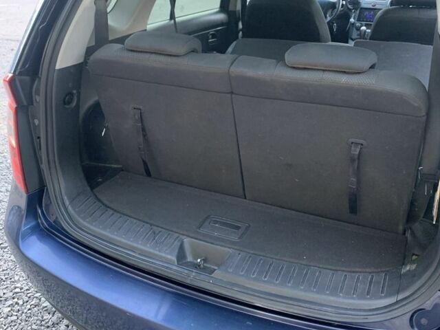 Синий Киа Каренс, объемом двигателя 2 л и пробегом 234 тыс. км за 6500 $, фото 3 на Automoto.ua