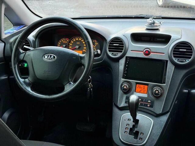 Синий Киа Каренс, объемом двигателя 2 л и пробегом 234 тыс. км за 6990 $, фото 23 на Automoto.ua