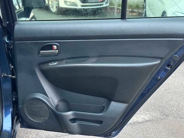 Синий Киа Каренс, объемом двигателя 2 л и пробегом 234 тыс. км за 6990 $, фото 18 на Automoto.ua