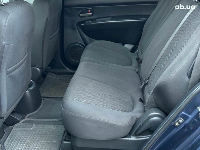 Синий Киа Каренс, объемом двигателя 2 л и пробегом 234 тыс. км за 6990 $, фото 16 на Automoto.ua