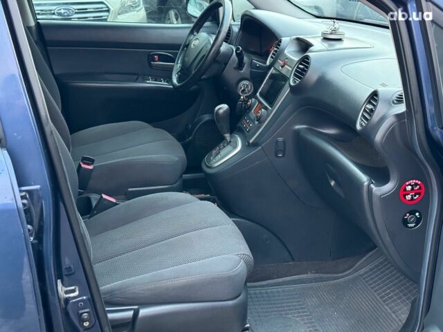 Синий Киа Каренс, объемом двигателя 2 л и пробегом 234 тыс. км за 6990 $, фото 22 на Automoto.ua
