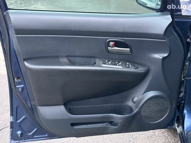 Синий Киа Каренс, объемом двигателя 2 л и пробегом 234 тыс. км за 6990 $, фото 10 на Automoto.ua