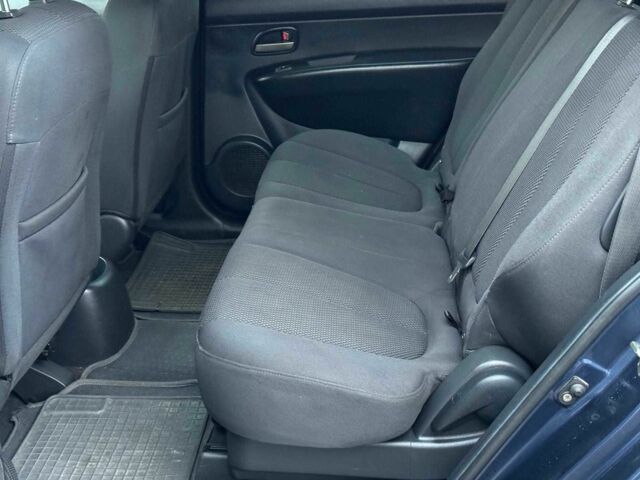 Синий Киа Каренс, объемом двигателя 2 л и пробегом 234 тыс. км за 6990 $, фото 16 на Automoto.ua