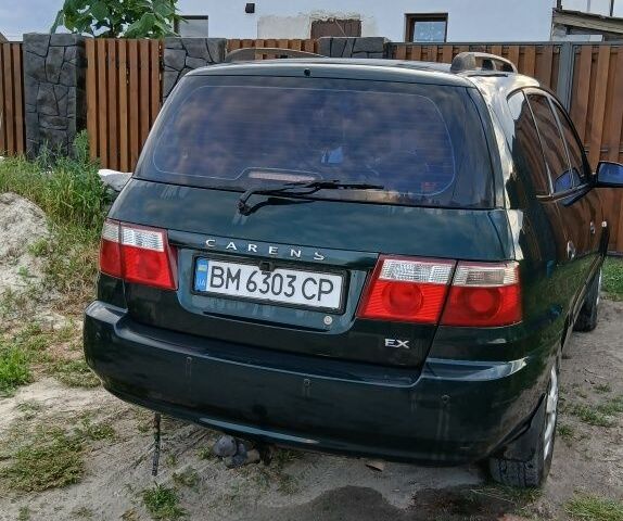 Зелений Кіа Каренс, об'ємом двигуна 1.8 л та пробігом 300 тис. км за 4300 $, фото 7 на Automoto.ua