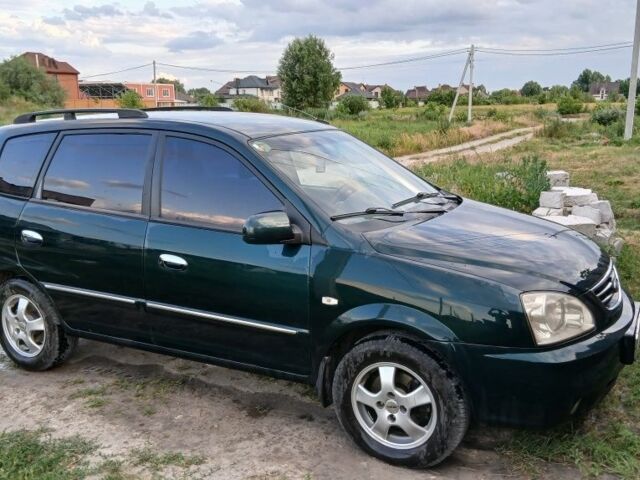 Зелений Кіа Каренс, об'ємом двигуна 1.8 л та пробігом 300 тис. км за 4300 $, фото 5 на Automoto.ua