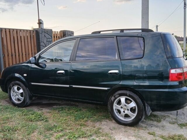 Зелений Кіа Каренс, об'ємом двигуна 1.8 л та пробігом 300 тис. км за 4300 $, фото 4 на Automoto.ua