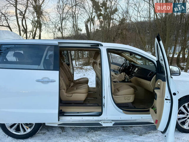 Білий Кіа Карнівал, об'ємом двигуна 2.2 л та пробігом 165 тис. км за 26700 $, фото 22 на Automoto.ua