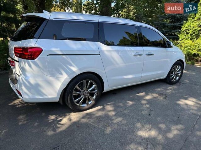 Білий Кіа Карнівал, об'ємом двигуна 2.2 л та пробігом 145 тис. км за 30490 $, фото 6 на Automoto.ua