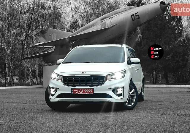 Белый Киа Карнивал, объемом двигателя 2.2 л и пробегом 134 тыс. км за 28800 $, фото 2 на Automoto.ua