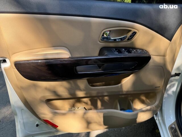 Белый Киа Карнивал, объемом двигателя 2.2 л и пробегом 145 тыс. км за 30490 $, фото 14 на Automoto.ua