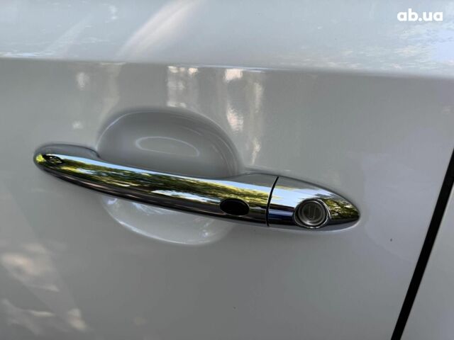 Белый Киа Карнивал, объемом двигателя 2.2 л и пробегом 145 тыс. км за 30490 $, фото 13 на Automoto.ua