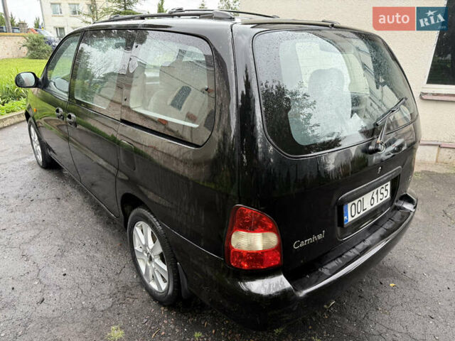 Черный Киа Карнивал, объемом двигателя 2.9 л и пробегом 250 тыс. км за 2100 $, фото 3 на Automoto.ua