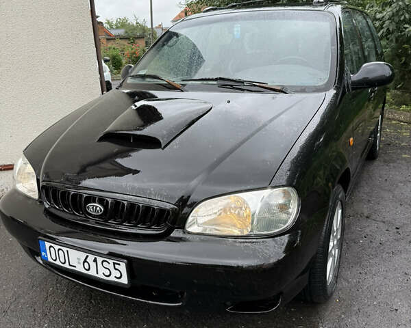 Черный Киа Карнивал, объемом двигателя 2.9 л и пробегом 250 тыс. км за 2100 $, фото 1 на Automoto.ua