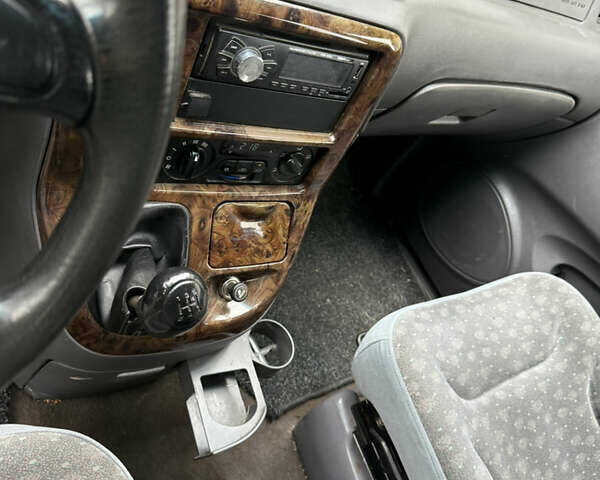 Черный Киа Карнивал, объемом двигателя 2.9 л и пробегом 250 тыс. км за 2100 $, фото 5 на Automoto.ua