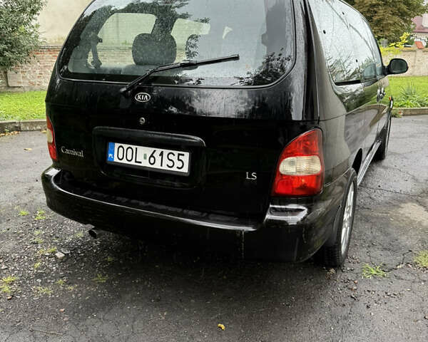 Черный Киа Карнивал, объемом двигателя 2.9 л и пробегом 250 тыс. км за 2100 $, фото 2 на Automoto.ua