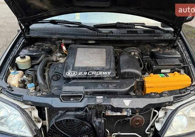 Черный Киа Карнивал, объемом двигателя 2.9 л и пробегом 270 тыс. км за 3000 $, фото 17 на Automoto.ua