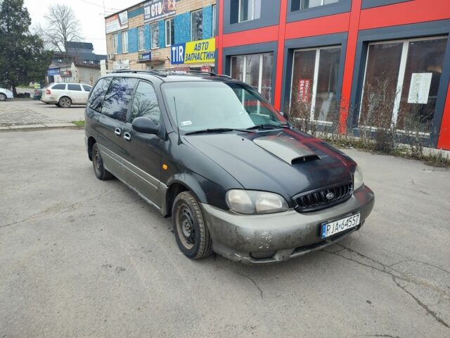 Черный Киа Карнивал, объемом двигателя 2.9 л и пробегом 260 тыс. км за 1500 $, фото 1 на Automoto.ua