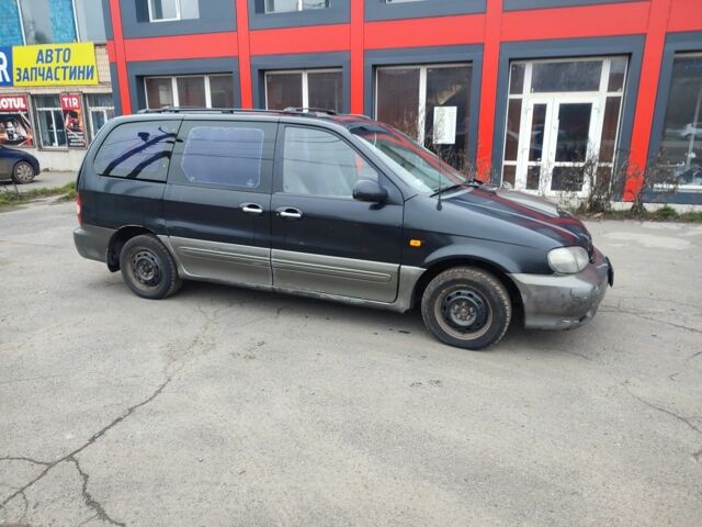 Черный Киа Карнивал, объемом двигателя 2.9 л и пробегом 260 тыс. км за 1500 $, фото 2 на Automoto.ua