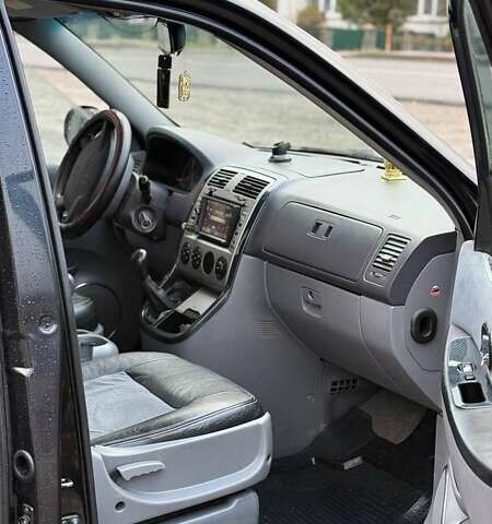 Черный Киа Карнивал, объемом двигателя 2.9 л и пробегом 270 тыс. км за 3000 $, фото 4 на Automoto.ua