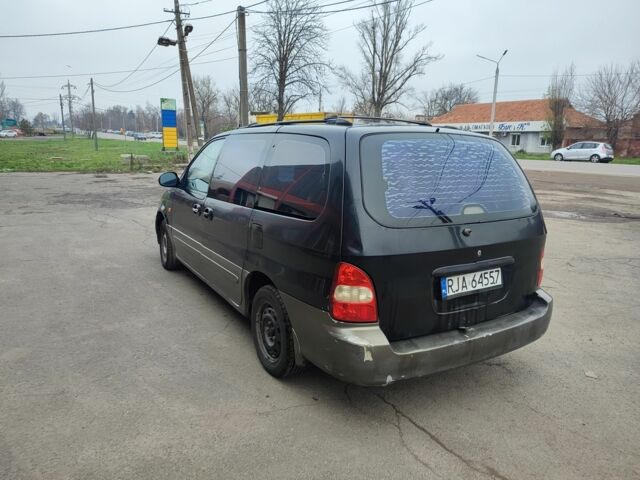 Черный Киа Карнивал, объемом двигателя 2.9 л и пробегом 260 тыс. км за 1500 $, фото 4 на Automoto.ua