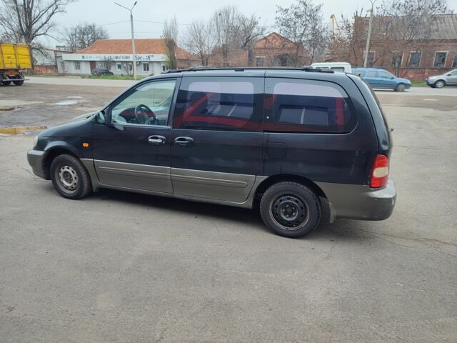 Черный Киа Карнивал, объемом двигателя 2.9 л и пробегом 260 тыс. км за 1500 $, фото 3 на Automoto.ua