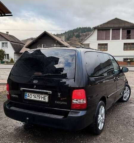 Черный Киа Карнивал, объемом двигателя 2.9 л и пробегом 270 тыс. км за 3000 $, фото 1 на Automoto.ua