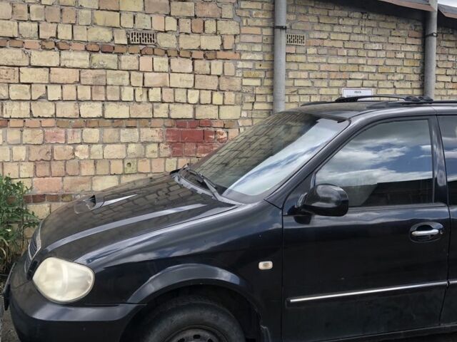 Черный Киа Карнивал, объемом двигателя 2.9 л и пробегом 200 тыс. км за 2000 $, фото 2 на Automoto.ua