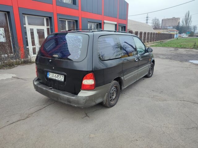 Черный Киа Карнивал, объемом двигателя 2.9 л и пробегом 260 тыс. км за 1500 $, фото 5 на Automoto.ua