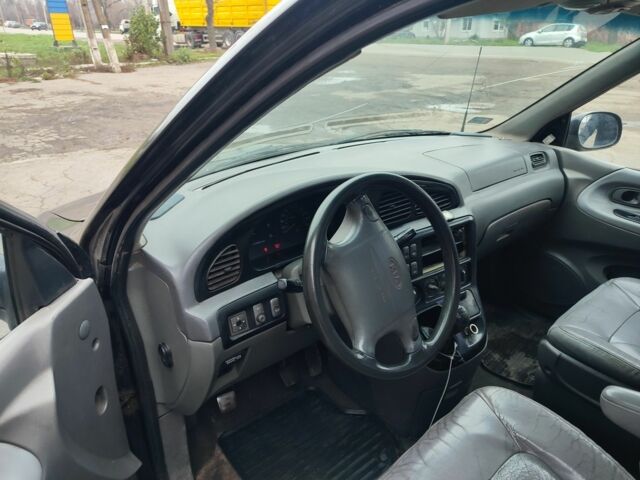 Черный Киа Карнивал, объемом двигателя 2.9 л и пробегом 260 тыс. км за 1500 $, фото 6 на Automoto.ua