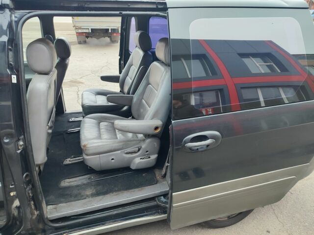 Черный Киа Карнивал, объемом двигателя 2.9 л и пробегом 260 тыс. км за 1500 $, фото 7 на Automoto.ua