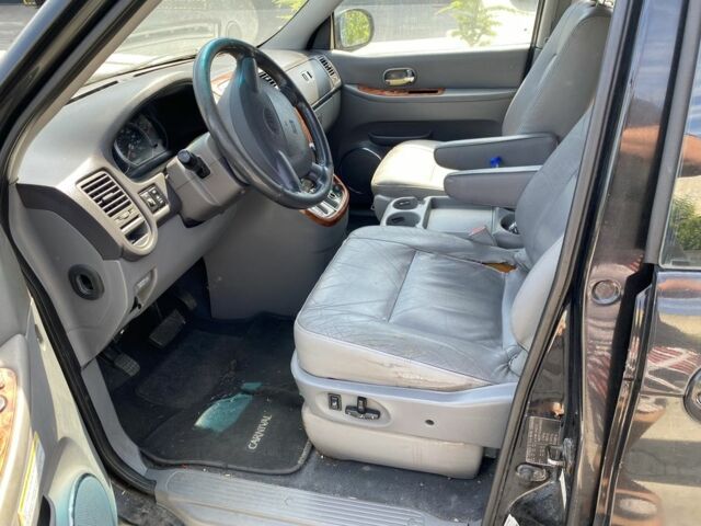 Киа Карнивал 2004 в Ровно на Automoto.ua Черный Киа Карнивал, объемом двигателя 2.9 л и пробегом 300 тыс. км за 2100 $, фото 7 на Automoto.ua