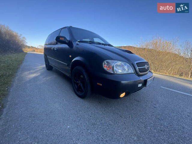 Черный Киа Карнивал, объемом двигателя 2.9 л и пробегом 245 тыс. км за 3250 $, фото 14 на Automoto.ua