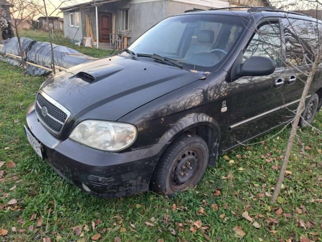 Черный Киа Карнивал, объемом двигателя 2.9 л и пробегом 300 тыс. км за 4600 $, фото 3 на Automoto.ua