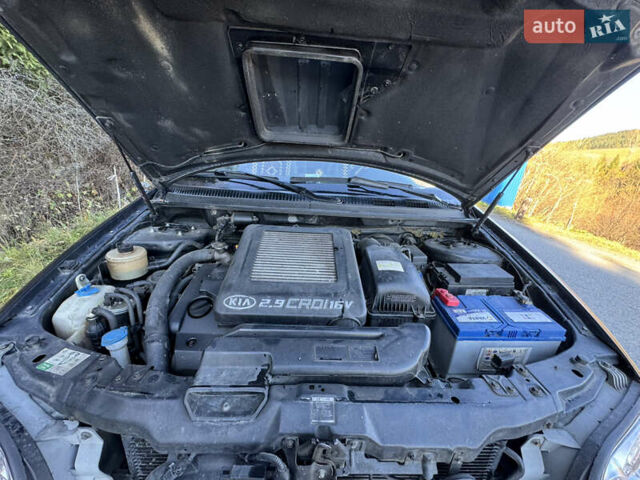 Черный Киа Карнивал, объемом двигателя 2.9 л и пробегом 245 тыс. км за 3250 $, фото 13 на Automoto.ua