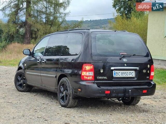 Черный Киа Карнивал, объемом двигателя 2.9 л и пробегом 420 тыс. км за 2999 $, фото 16 на Automoto.ua