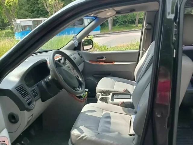 Киа Карнивал 2004 в Виннице на Automoto.ua Черный Киа Карнивал, объемом двигателя 2.9 л и пробегом 270 тыс. км за 4000 $, фото 2 на Automoto.ua