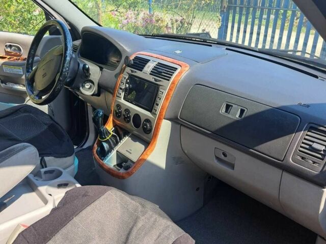 Черный Киа Карнивал, объемом двигателя 2.9 л и пробегом 300 тыс. км за 4600 $, фото 5 на Automoto.ua