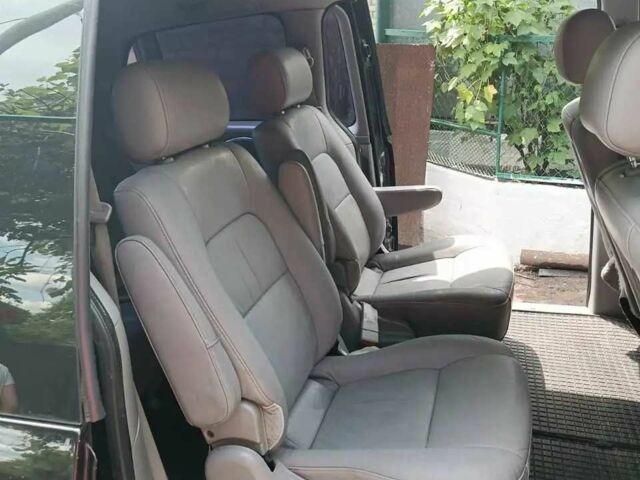 Киа Карнивал 2004 в Виннице на Automoto.ua Черный Киа Карнивал, объемом двигателя 2.9 л и пробегом 270 тыс. км за 4000 $, фото 7 на Automoto.ua