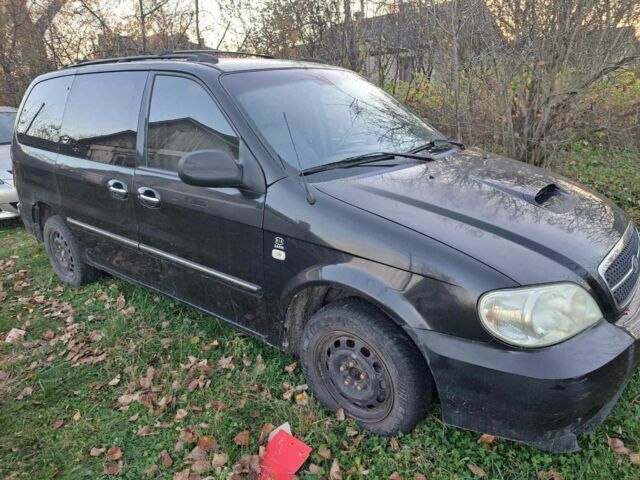 Черный Киа Карнивал, объемом двигателя 2.9 л и пробегом 300 тыс. км за 4600 $, фото 1 на Automoto.ua