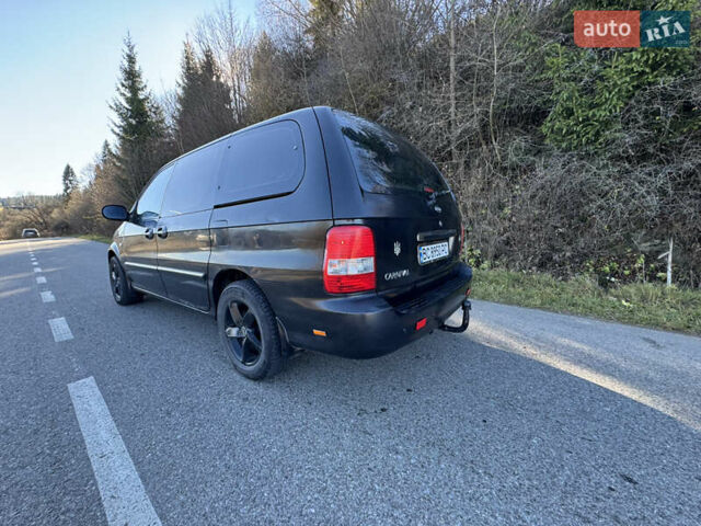 Черный Киа Карнивал, объемом двигателя 2.9 л и пробегом 245 тыс. км за 3250 $, фото 4 на Automoto.ua