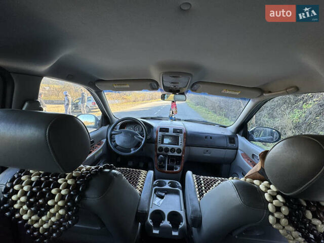 Черный Киа Карнивал, объемом двигателя 2.9 л и пробегом 245 тыс. км за 3250 $, фото 12 на Automoto.ua