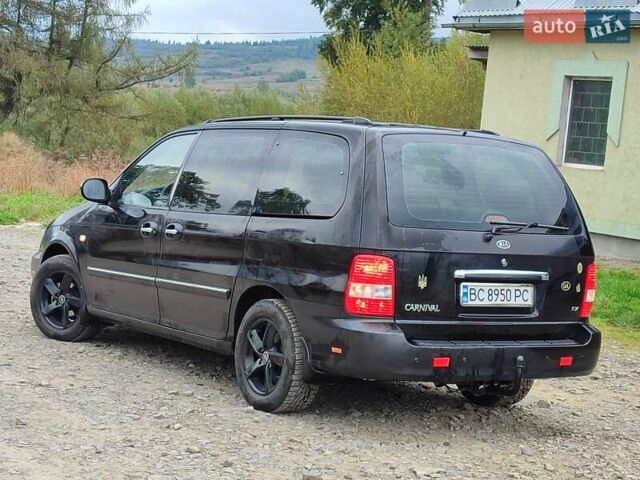 Черный Киа Карнивал, объемом двигателя 2.9 л и пробегом 420 тыс. км за 2999 $, фото 12 на Automoto.ua
