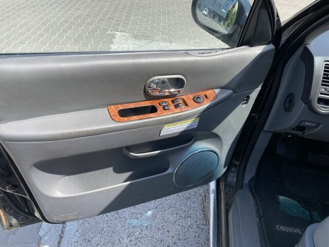 Киа Карнивал 2004 в Ровно на Automoto.ua Черный Киа Карнивал, объемом двигателя 2.9 л и пробегом 300 тыс. км за 2100 $, фото 9 на Automoto.ua