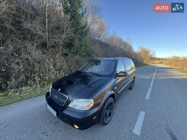 Черный Киа Карнивал, объемом двигателя 2.9 л и пробегом 245 тыс. км за 3250 $, фото 1 на Automoto.ua