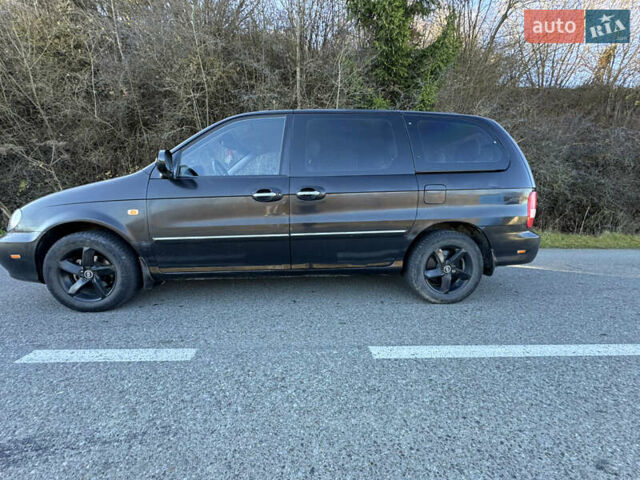 Черный Киа Карнивал, объемом двигателя 2.9 л и пробегом 245 тыс. км за 3250 $, фото 5 на Automoto.ua