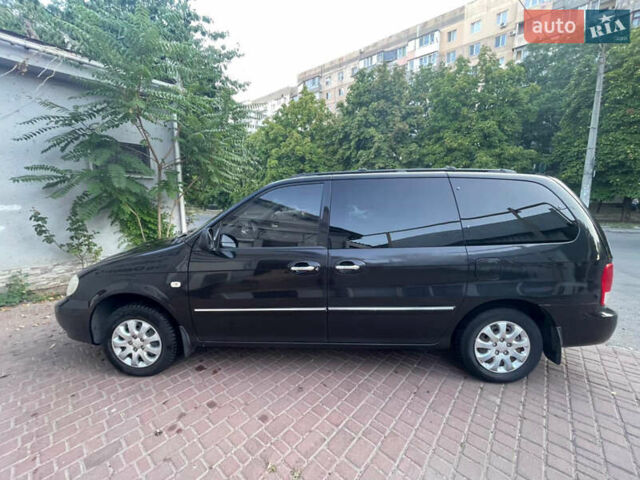 Черный Киа Карнивал, объемом двигателя 2.9 л и пробегом 220 тыс. км за 5300 $, фото 2 на Automoto.ua