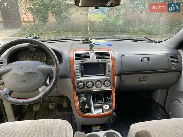 Черный Киа Карнивал, объемом двигателя 2.9 л и пробегом 220 тыс. км за 5300 $, фото 4 на Automoto.ua