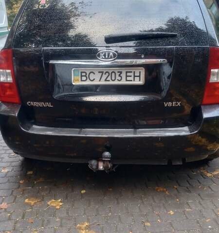 Кіа Карнівал 2006 у Львові на Automoto.ua Чорний Кіа Карнівал, об'ємом двигуна 2.9 л та пробігом 292 тис. км за 8803 $, фото 1 на Automoto.ua